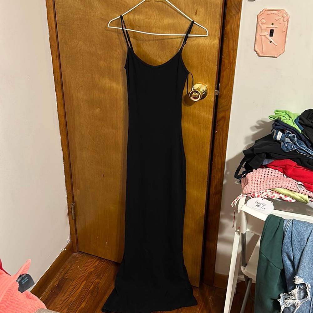 Long bodycon dress Price is negotiable. NEVER WORN! bought wrong size! Has Tags!